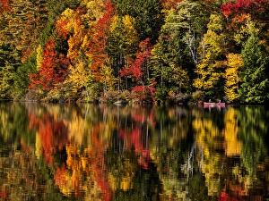 New Hampshire Prints: USA, New Hampshire, White Mountains, Fall reflections and canoeing on Russell Pond