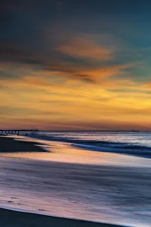 Images Dated 16th February 2018: USA, New Jersey, Cape May National Seashore. Sunrise on winter shoreline. Credit as