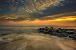 Images Dated 18th January 2020: USA, New Jersey, Cape May National Seashore. Sunset on ocean and rocks