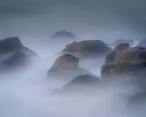 Images Dated 29th April 2021: USA, New Jersey, Cape May National Seashore. Waves breaking over rocks