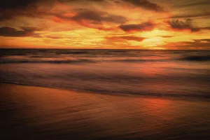 USA, New Jersey, Cape May National Seashore. Sunset on ocean shore
