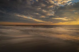 USA, New Jersey, Cape May National Seashore. Sunset on ocean shore