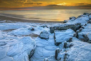 Images Dated 14th December 2022: USA, New Jersey, Cape May National Seashore. Ice and snow on ocean shore