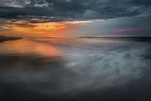 Moody Prints: USA, New Jersey, Cape May National Seashore. Sunrise on shoreline