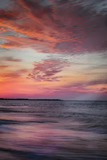 USA, New Jersey, Cape May National Seashore. Sunset on ocean and beach. &copy;Jay O'Brien / Jaynes Gallery / DanitaDelimont.com