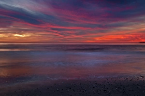 Images Dated 27th November 2011: USA, New Jersey, Cape May. Purple-colored sunrise on ocean shore