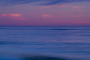 Cape May Prints: USA, New Jersey, Cape May. Purple-colored sunrise on ocean shore