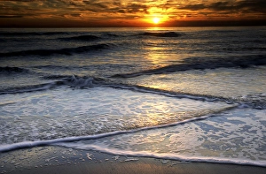 Images Dated 6th March 2010: USA, New Jersey, Cape May. Sunset reflection on beach