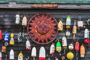 Jay Obrien Prints: USA, New Jersey. Fishing floats and sun disc as wall decorations