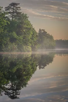 Images Dated 4th October 2021: USA, New Jersey, Pinelands National Reserve. Sunrise reflections in lake