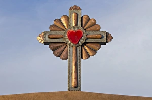 Images Dated 4th April 2012: USA, New Mexico, Chimayo - Gilded cross atop of a roman catholic church in Chimayo