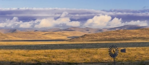 Images Dated 16th November 2014: USA, New Mexico, City of Rocks State Park. Windmill in landscape panoramic. Credit as