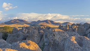 Images Dated 16th November 2014: USA, New Mexico, City of Rocks State Park. Landscape of boulders and mountains. Credit as