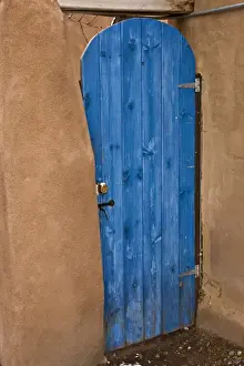 Images Dated 14th December 2008: USA, New Mexico, Santa Fe. Blue door contrasts with tan adobe building