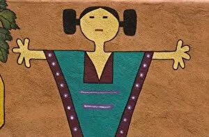 USA, New Mexico, Santa Fe. Close-up section of woman in a wall mural on the outside of a building