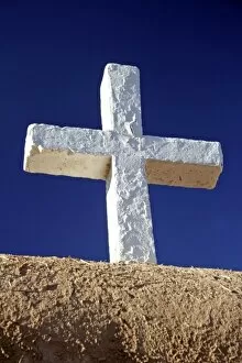 USA, New Mexico, Taos. A wooden cross of the San Francisco de Asis adobe church