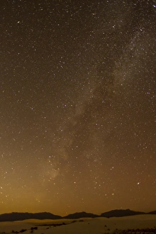 Images Dated 6th December 2015: USA, New Mexico, White Sands National Monument. Milky Way over desert at night. Credit as