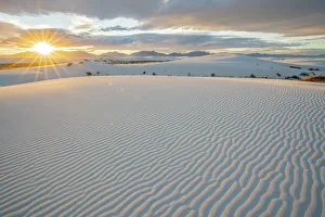 Images Dated 9th April 2022: USA, New Mexico, White Sands National Monument. Sunset on white sand dunes and clouds