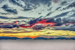 USA, New Mexico, White Sands National Park. Sunset over desert and San Andres Mountains