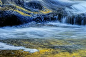 Images Dated 30th September 2006: USA, New York, Adirondack Mountains. Flowing stream at Buttermilk Falls. Credit as
