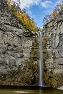 Images Dated 4th May 2024: USA, New York. Fall foliage and Taughannock Falls at State Park