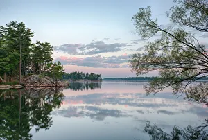 USA, New York State. Calm summer morning on the St. Lawrence River, Thousand Islands USA, New York State. Calm summer morning on the St. Lawrence River, Thousand Islands