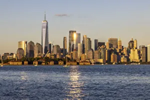 New York City Prints: USA, New York. View of New York City skyline at sunset from Port Liberte in Jersey City