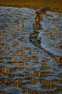 USA, New York, Watkins Glen. Reflections in water on rock