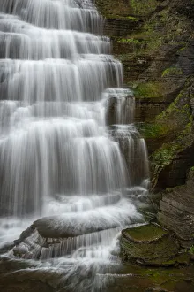 USA, New York, Watkins Glen. Waterfall cascade over rock