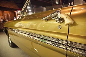 <b class=qtipBold><figcaption>USA, North America, Alabama</figcaption></b><br>USA, Alabama, Tuscumbia. Alabama Music Hall of Fame, Happy Hal Burns, cowboy car, six-shooter revolver as door handle.<br><em>© Walter Bibikow / DanitaDelimont.com</em> USA, North America, Alabama