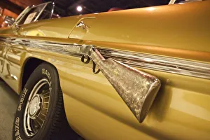 <b class=qtipBold><figcaption>USA, North America, Alabama</figcaption></b><br>USA, Alabama, Tuscumbia. Alabama Music Hall of Fame, Happy Hal Burns, cowboy car, Wiinchester Rifle on fender.<br><em>© Walter Bibikow / DanitaDelimont.com</em> USA, North America, Alabama