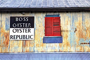 Images Dated 12th August 2012: USA; North America; Florida; Apalachicola; Old tin building with red shutters