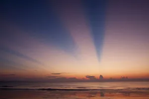 Images Dated 10th October 2009: USA, North America, Georgia, Tybee Island. Rays of light at the beach at sunrise