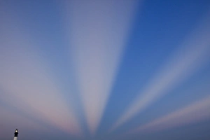 Images Dated 10th October 2009: USA, North America, Georgia, Tybee Island. Rays of clouds at sunrise