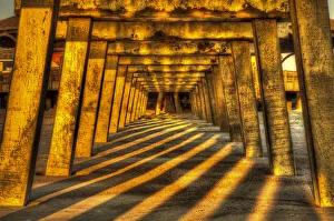 USA; North America; Georgia; Tybee Island; Tybee Pier with shadows at sunrise