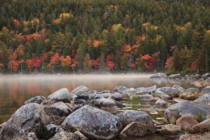USA; North America, Maine; Acadia National Park; Fall reflections with fog at Jordon pond
