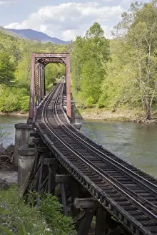 Images Dated 3rd May 2015: USA, North Carolina. Abandoned railroad trestle spans river