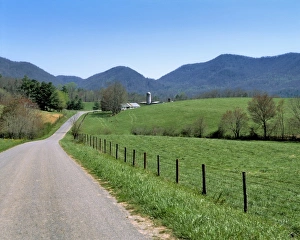 Silo Prints: USA, North Carolina, Asheville. A winding road leads to an isolated farm in the hills