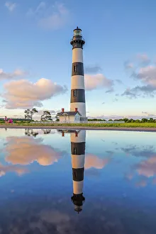 Lookout Prints: USA, North Carolina, Nags Head. Bodie Island Lighthouse reflection in a puddle