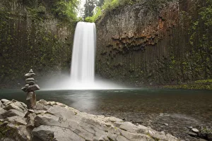 Basalt Prints: USA, Oregon. Abiqua Falls and stacked pile of rocks