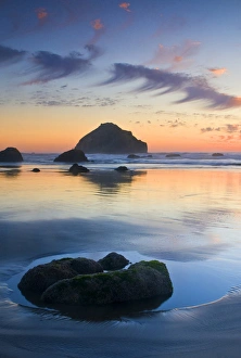 USA, Oregon, Bandon Beach. Face Rock and sea stacks at twilight