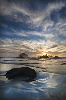 USA, Oregon, Bandon Beach. Face Rock and sea stacks at twilight