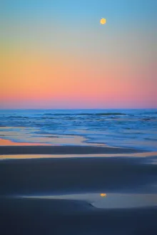 Moonset Prints: USA, Oregon, Bandon. Beach and full moonset. Credit as: Jean Carter / Jaynes Gallery /