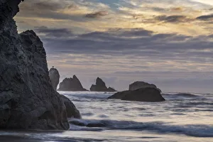 Sea Stack Prints: USA, Oregon, Bandon Beach. Pacific Ocean sea stacks at sunset
