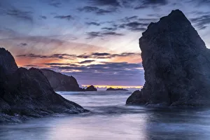 USA, Oregon, Bandon Beach. Pacific Ocean sea stacks at sunset