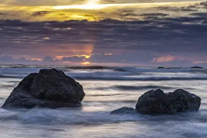 USA, Oregon, Bandon Beach. Pacific Ocean shoreline at sunset