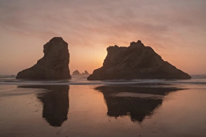 Images Dated 6th May 2016: USA, Oregon, Bandon Beach. Sea stacks silhouetted at sunset
