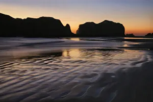 Images Dated 4th May 2019: USA, Oregon, Bandon. Sunset on beach sea stacks