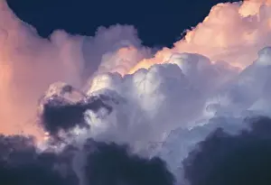 Boiling Prints: USA, Oregon, Bend. Boiling storm clouds turn pink and grey at sunset, Oregon