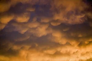 USA, Oregon, Bend. Mammatus clouds are often found hanging on the underside of as